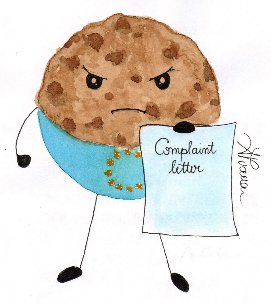 A chocolate chip cookie holding a complaint letter